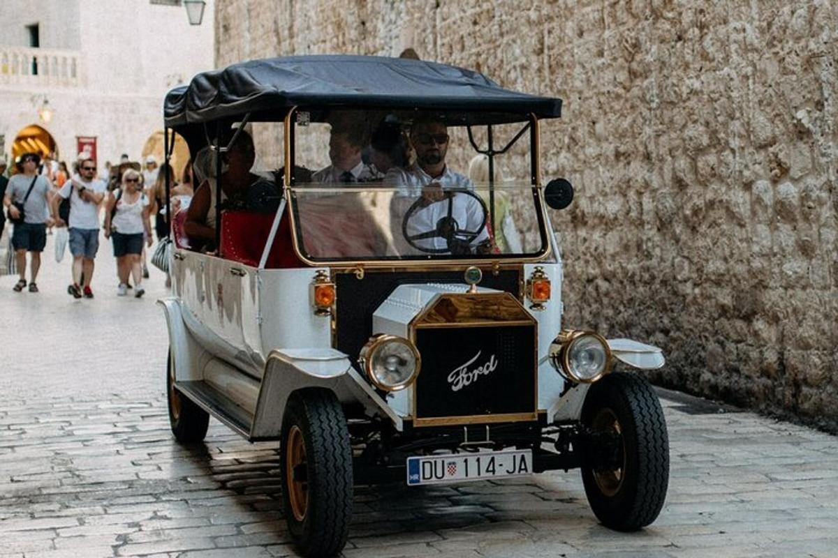 a group of people riding in a golf cart