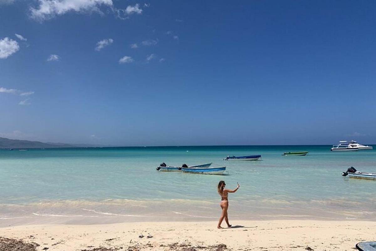 a woman in a bikini walking on a beach