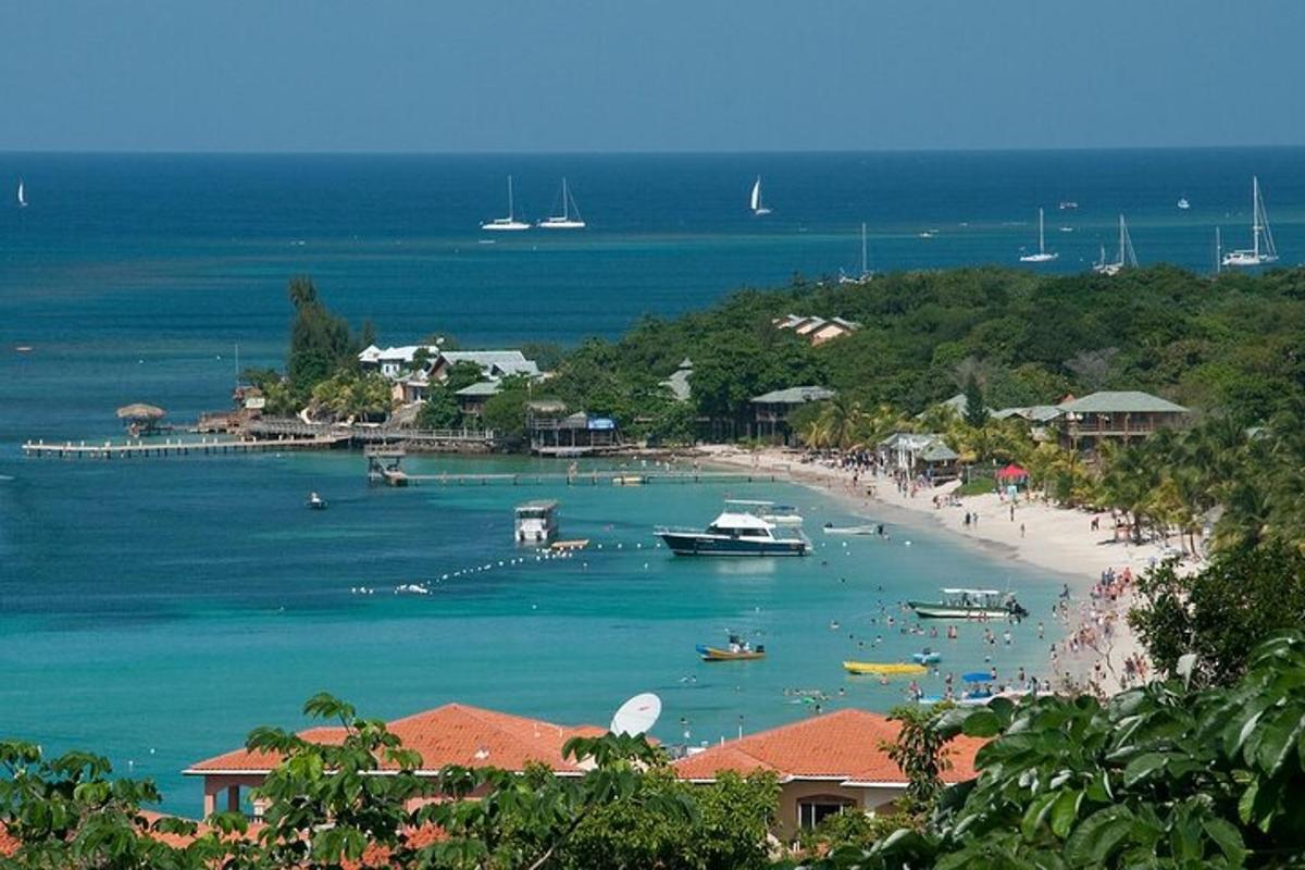 a view of a beach with boats in the water