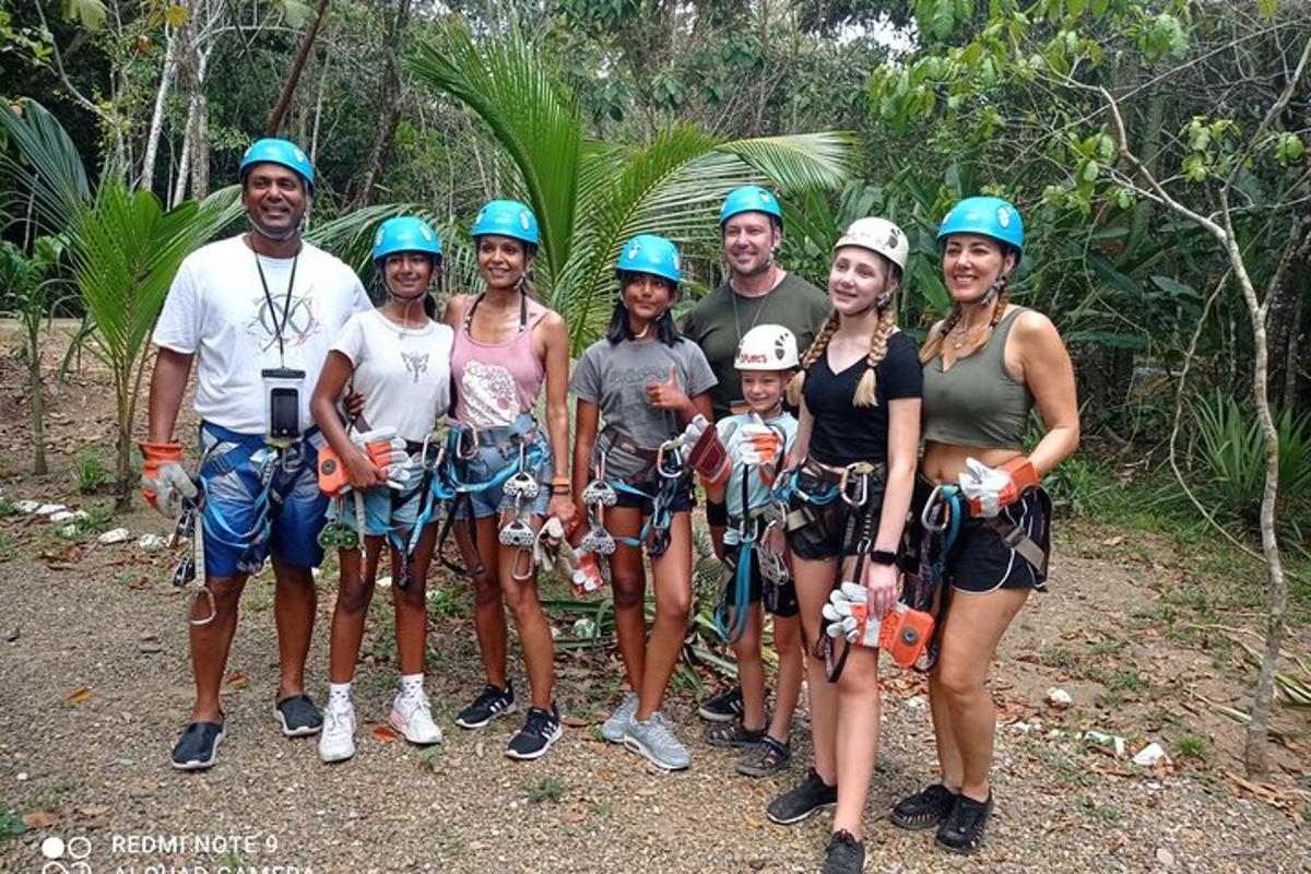 a group of people wearing helmets posing for a picture