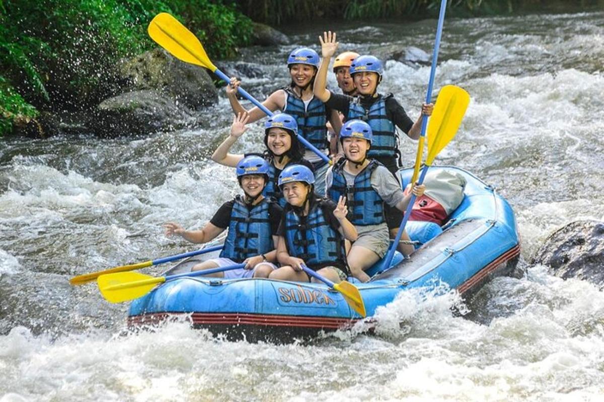 a group of people in a raft on a river