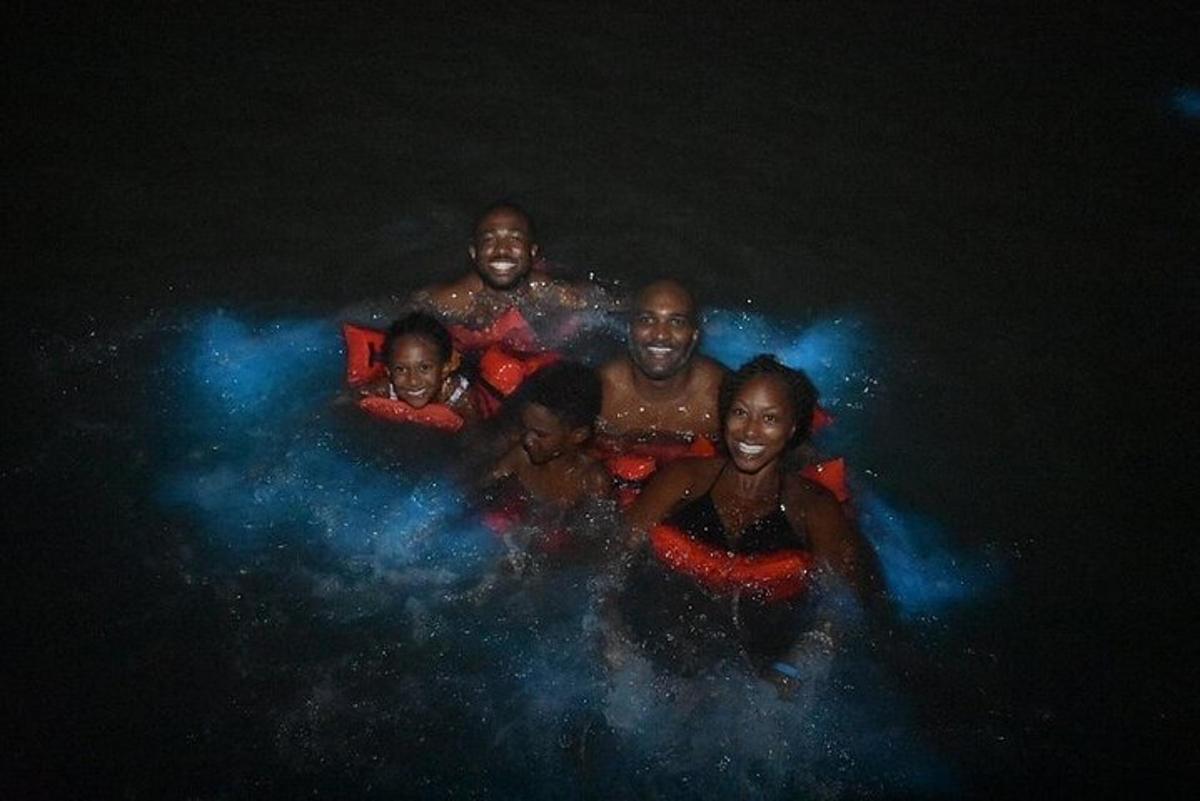 a group of people are in the water