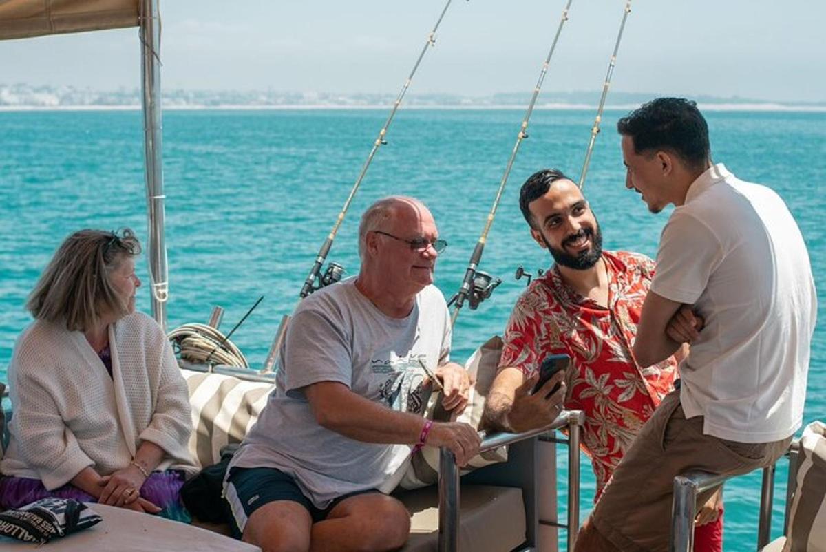 a group of people on a boat in the water