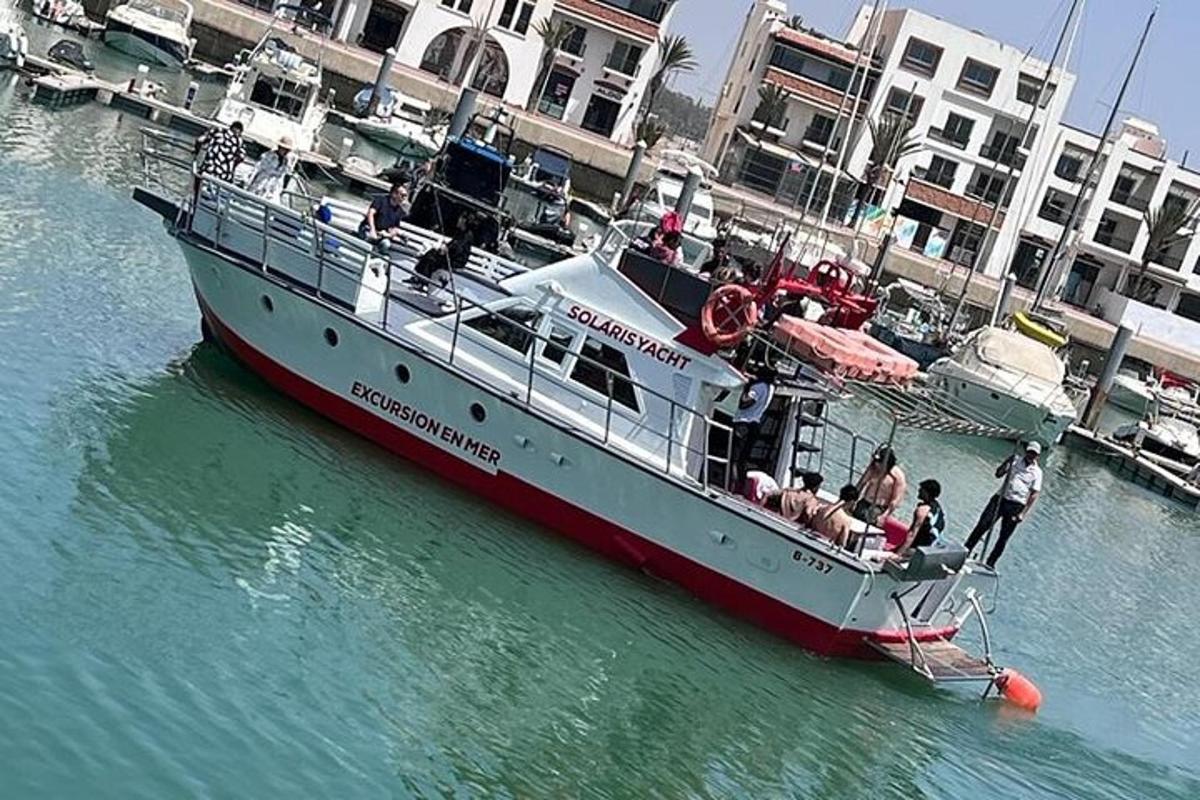 a boat in the water with people on it