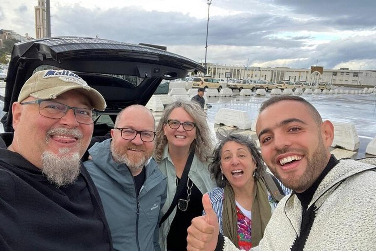 a group of people posing for a picture on a boat