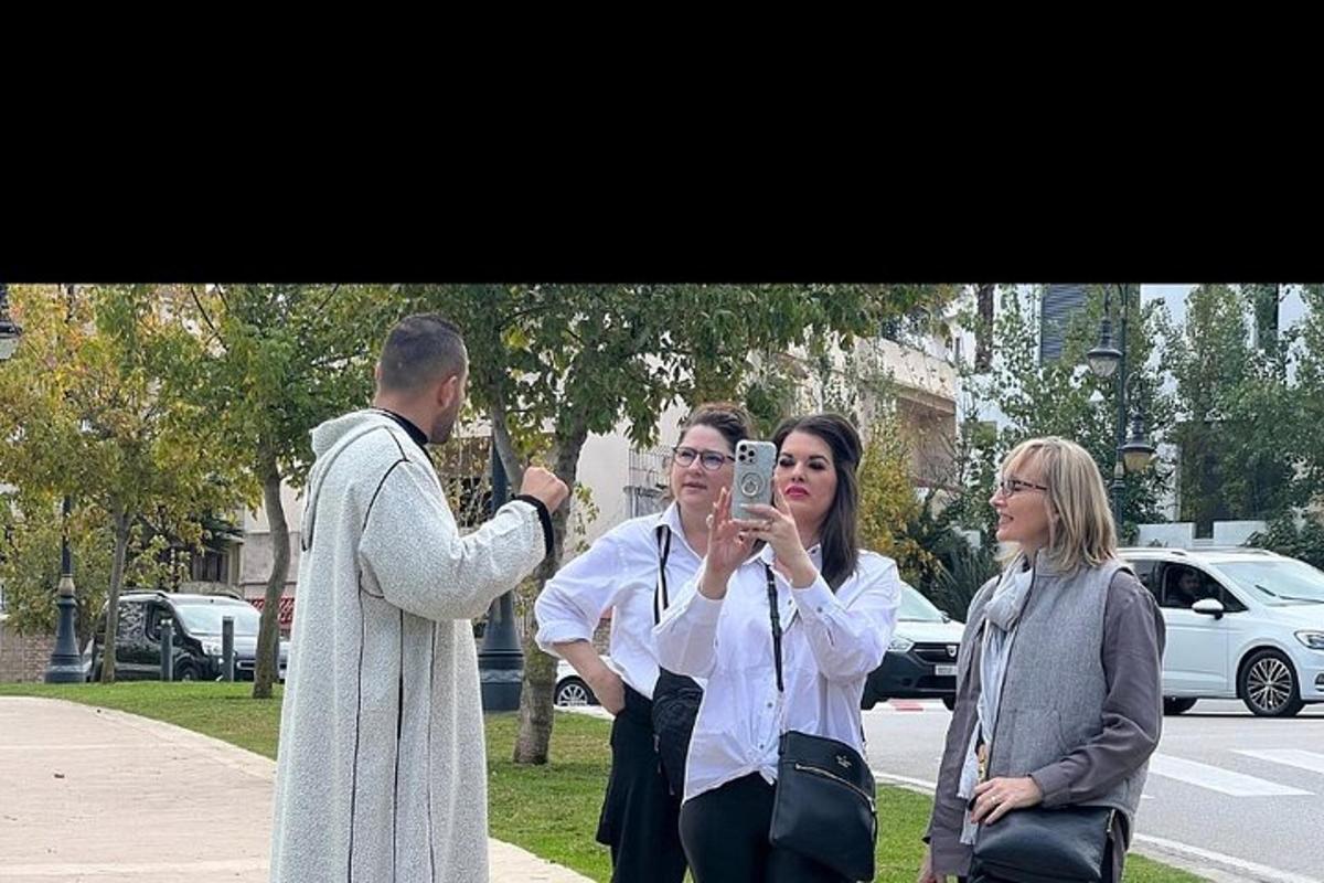 a man taking a picture of a woman taking a picture