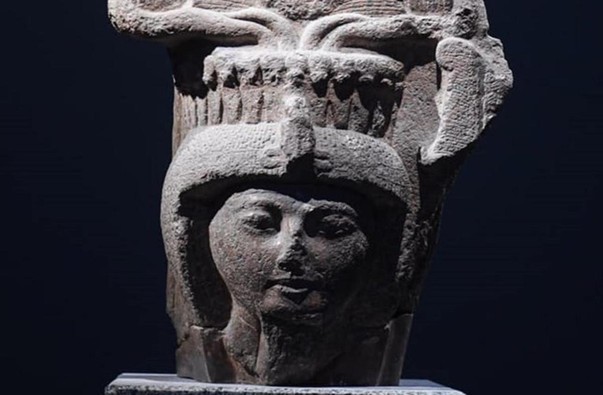 a statue of a head on top