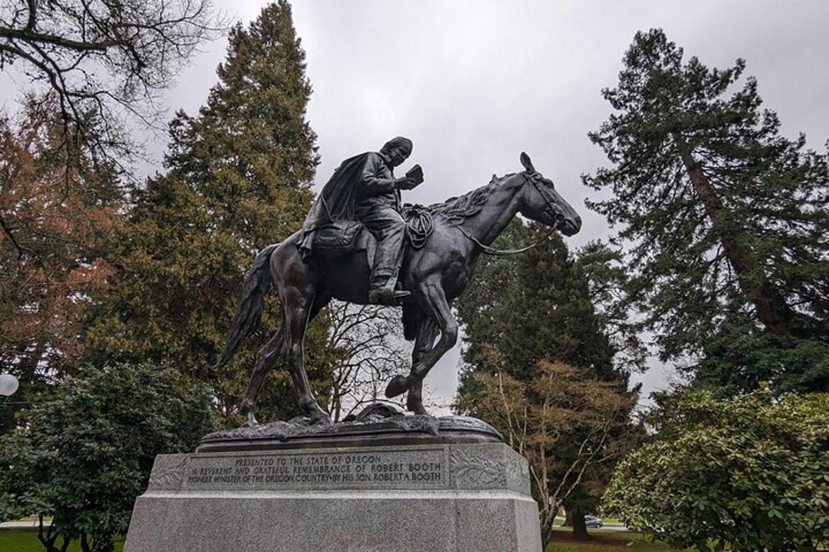 a statue of a man riding a horse