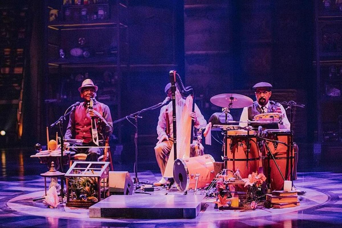 a group of men playing drums on a stage