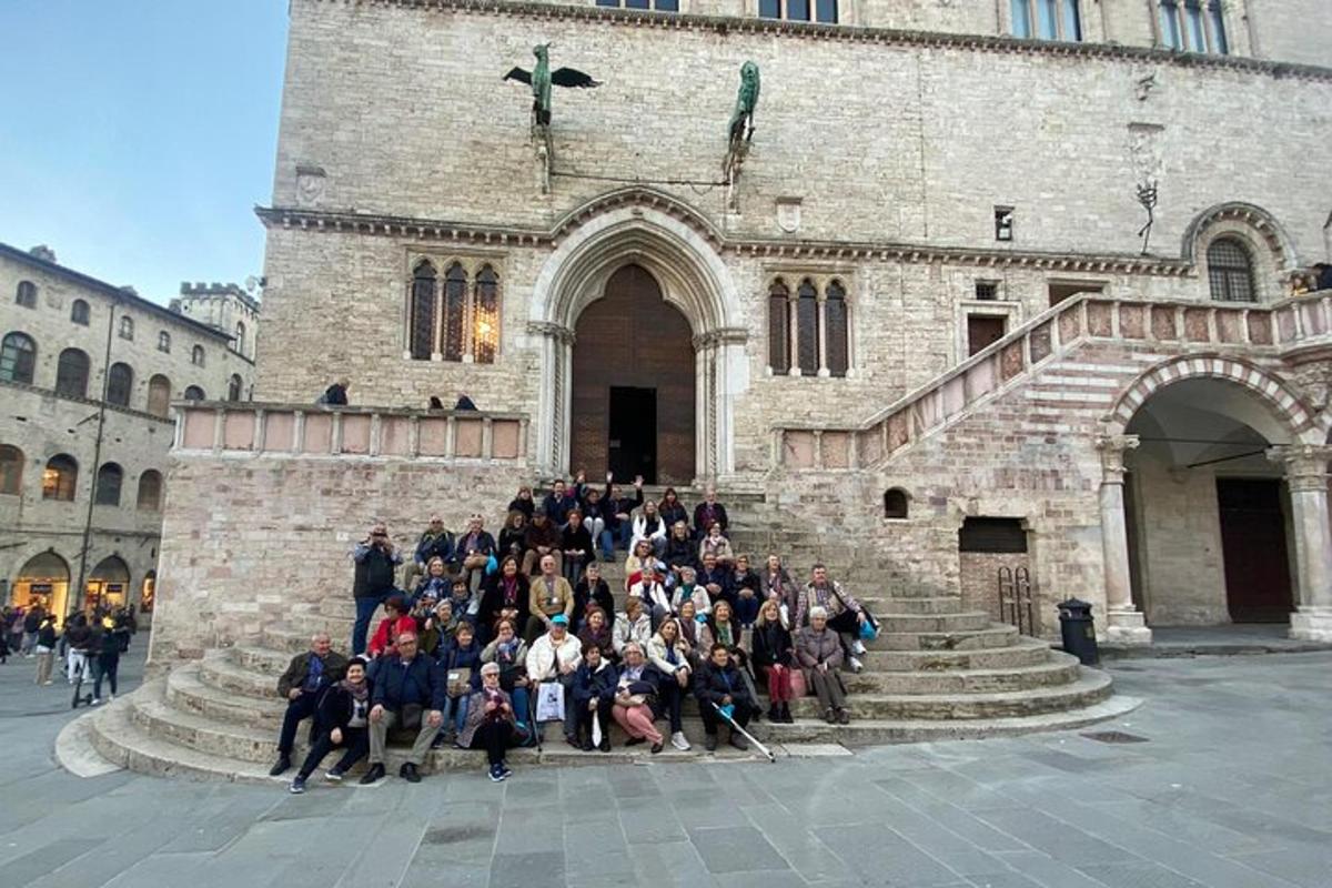 a group of people posing in front of a building