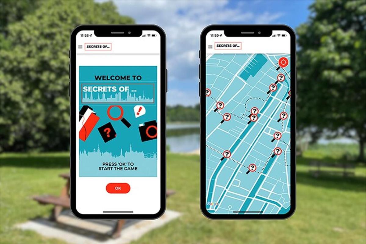 zwei Telefone, die nebeneinander in einem Park liegen
