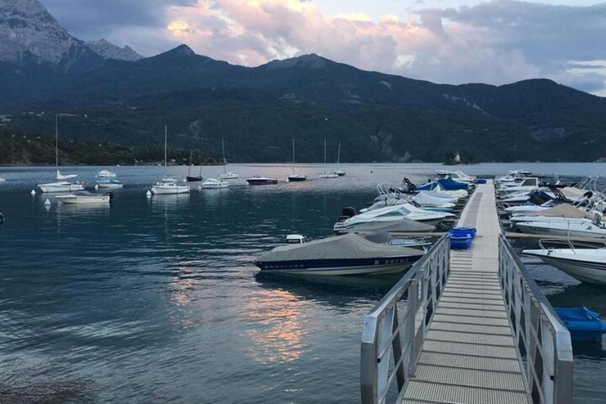 a bunch of boats are docked at a dock