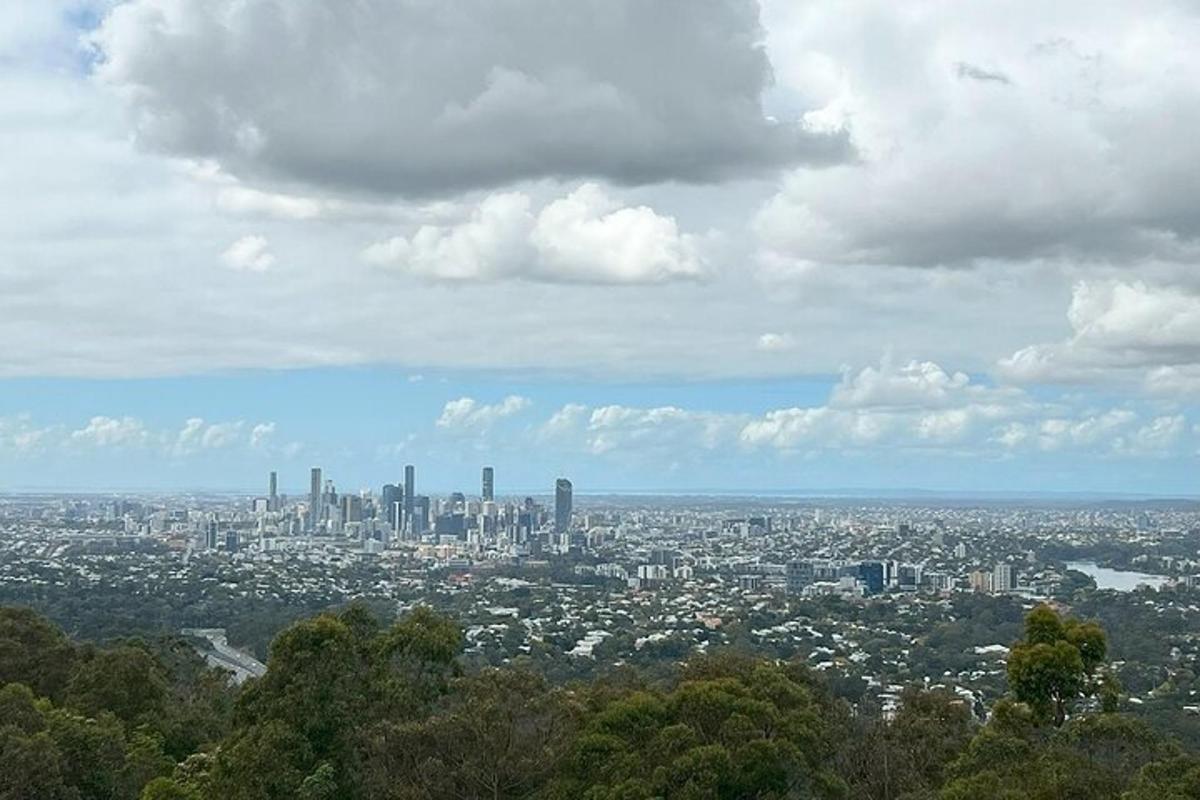 a view of a city from the top of a hill