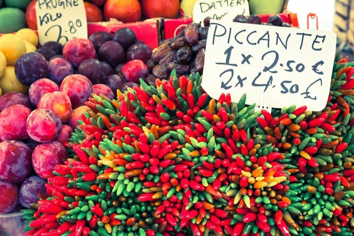 a display of fruits and vegetables with a price sign