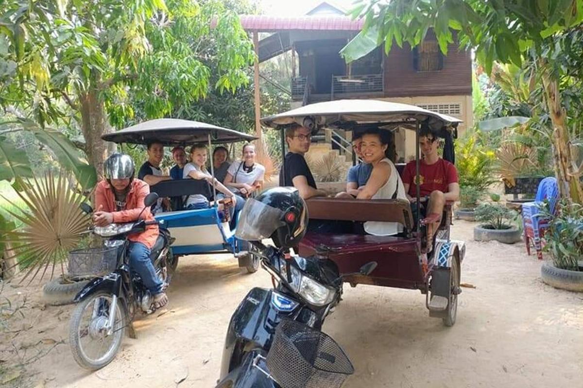 un gruppo di persone in carrozza trainata da cavalli