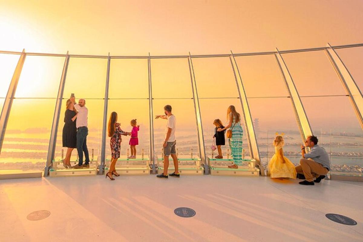 a group of people standing on the top of a building