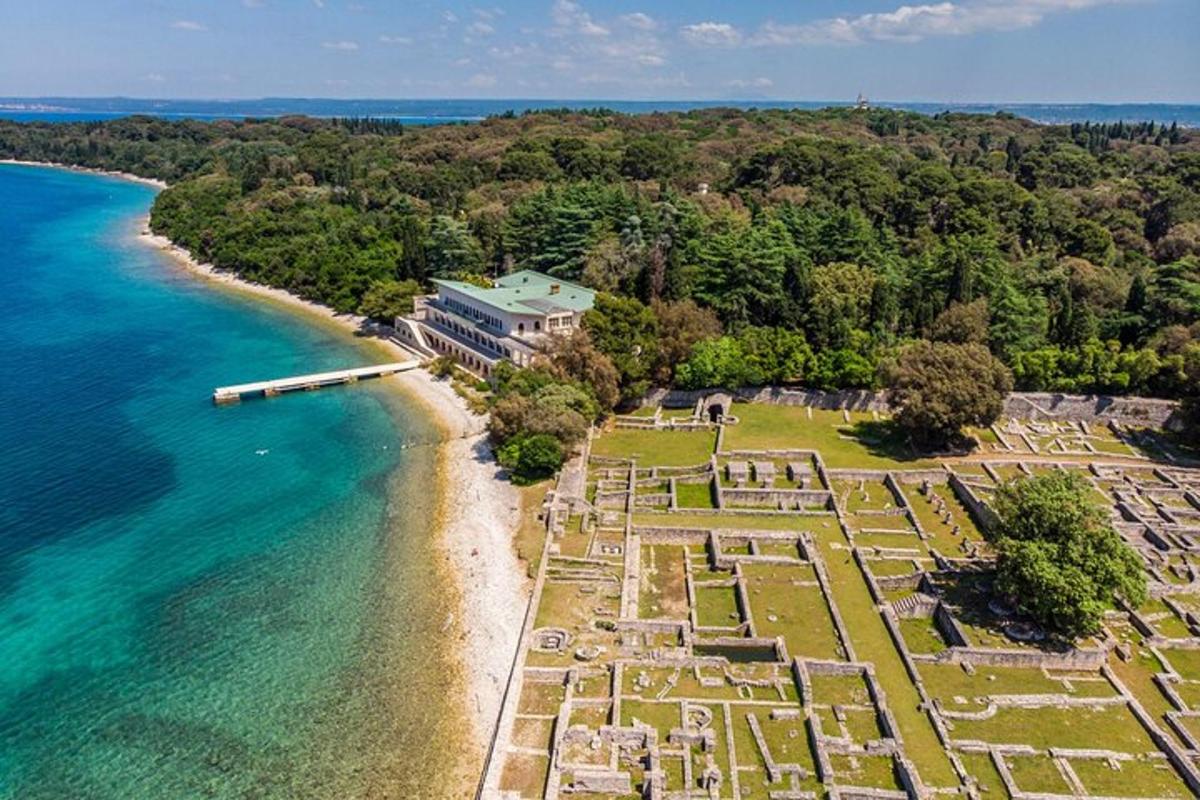 an aerial view of a resort on a beach