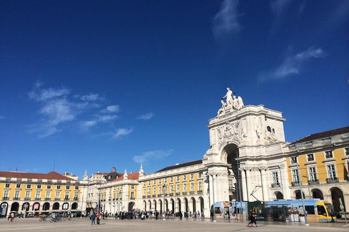 a large building with a statue on top of it