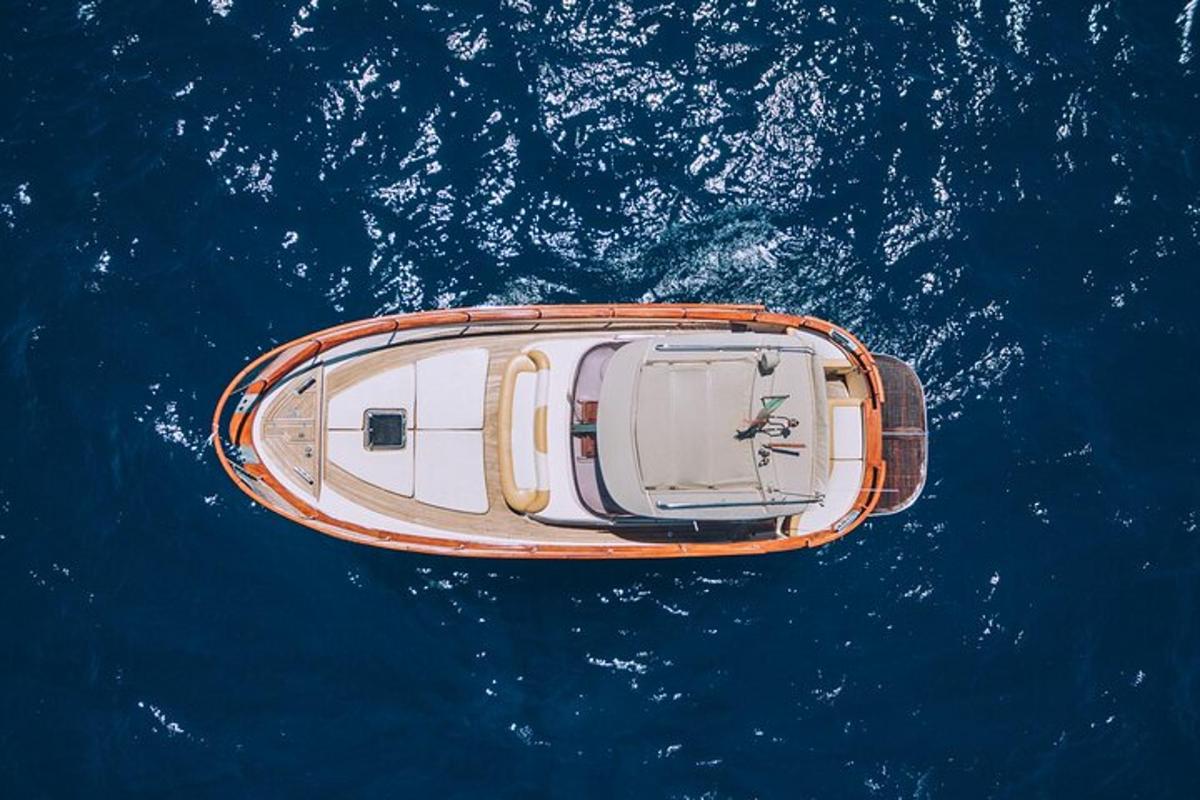 an overhead view of a boat in the water