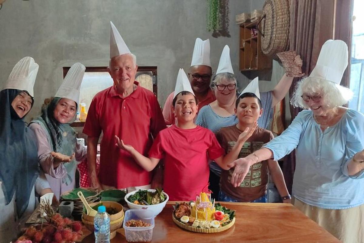a group of people wearing chefs hats in a kitchen