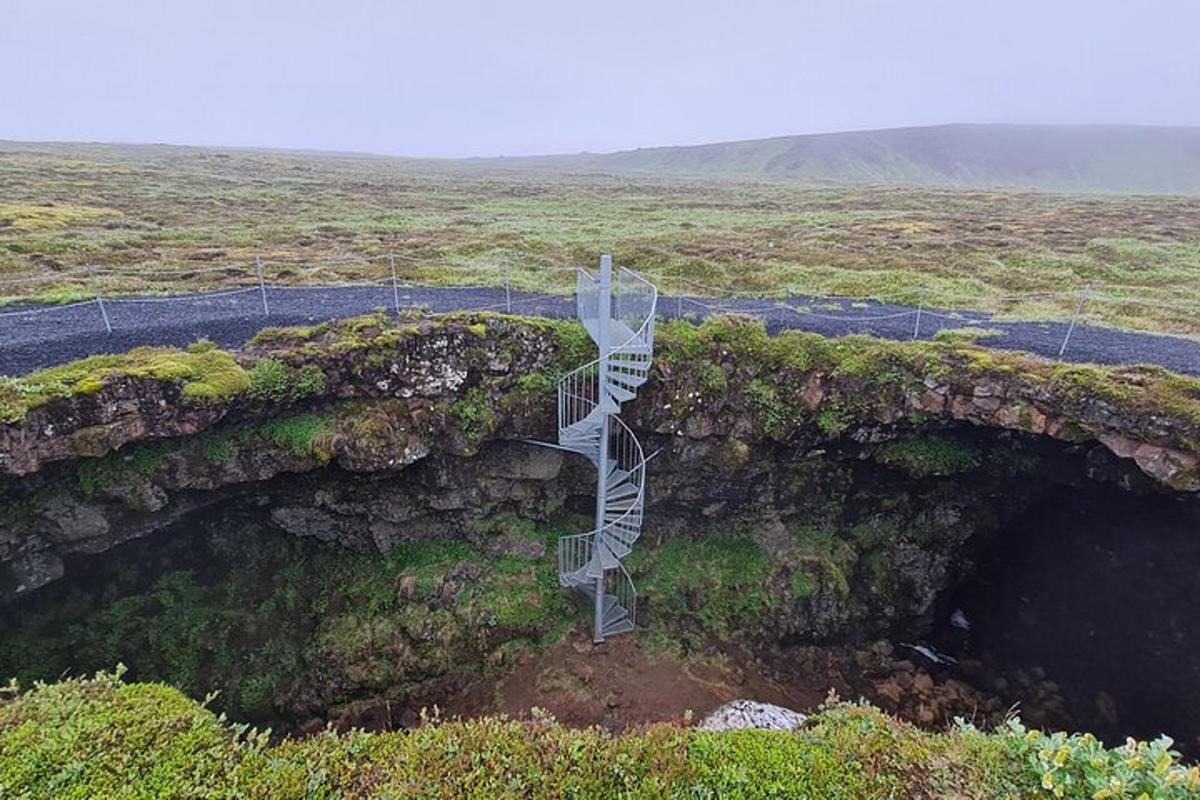 an aerial view of a staircase on a rock formation
