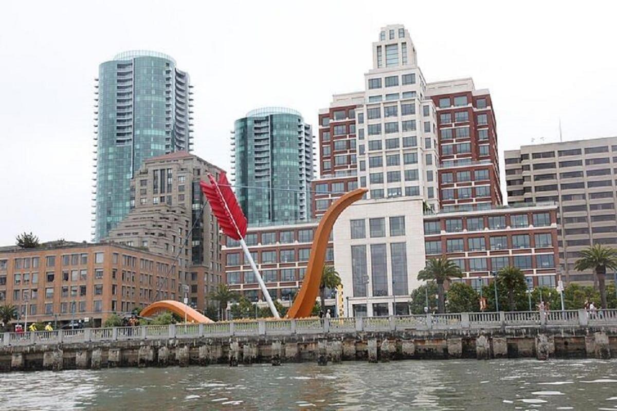 a view of a city with a river and buildings