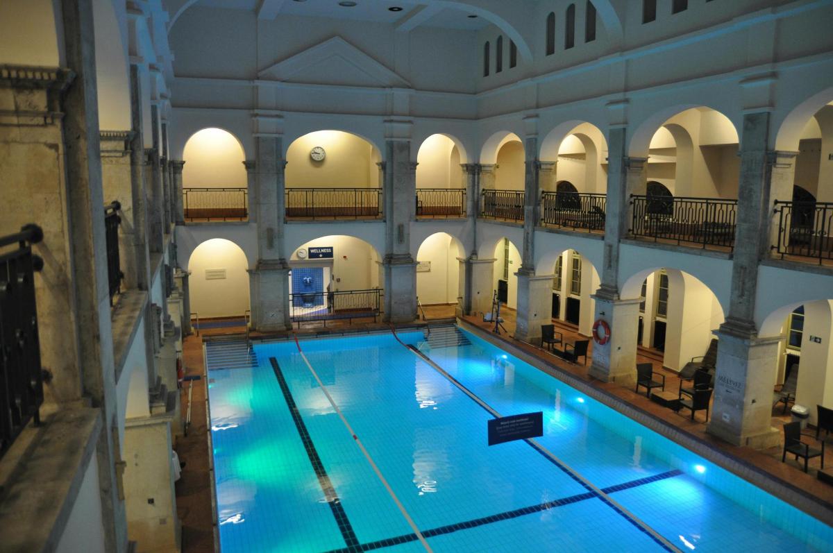 an overhead view of a swimming pool in a building