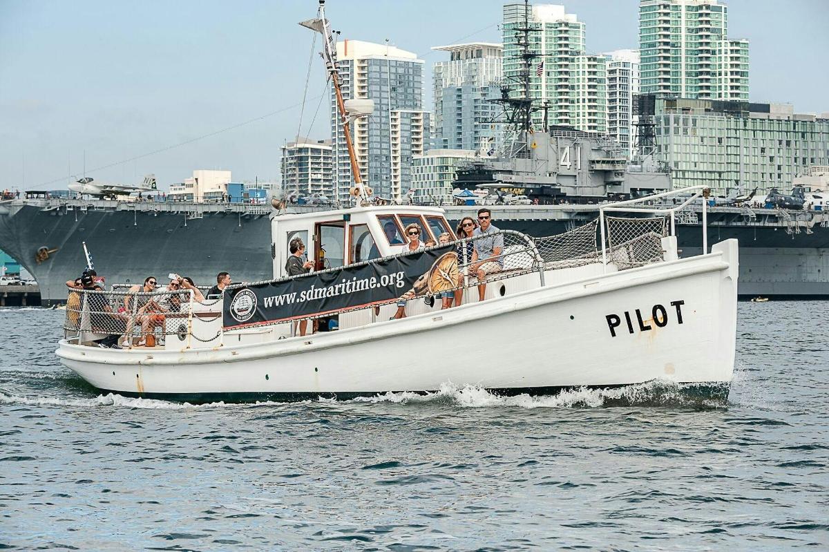 a group of people on a boat in the water