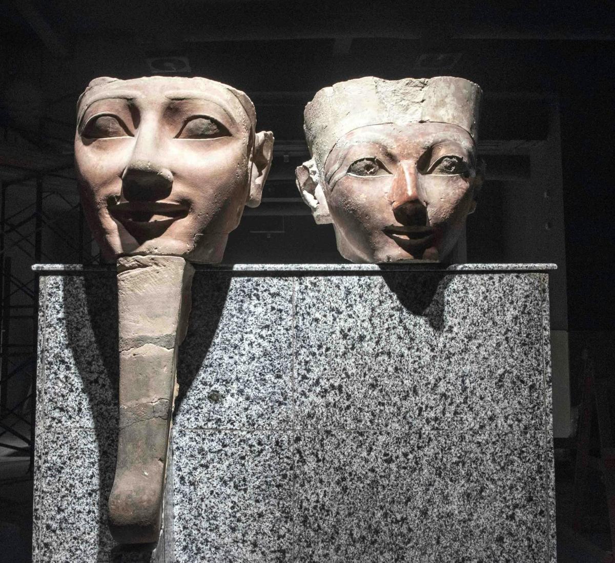 a statue of a bust of a man and a woman