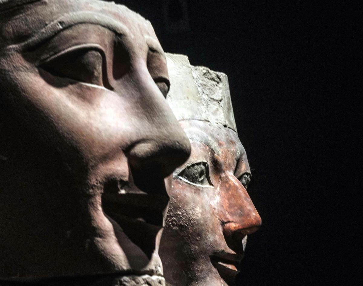 a statue of a man wearing a helmet
