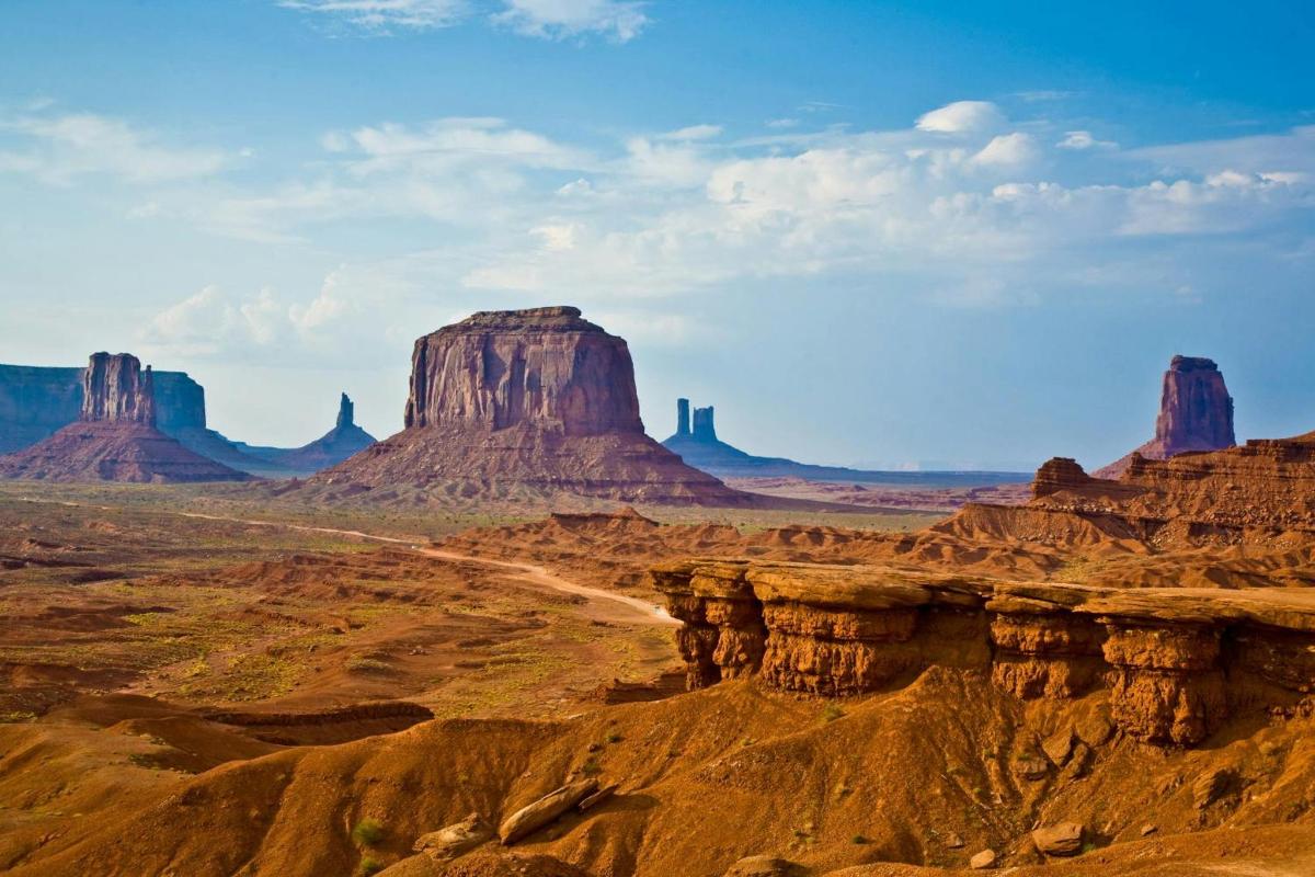 a view of the american desert with rocks and mountains