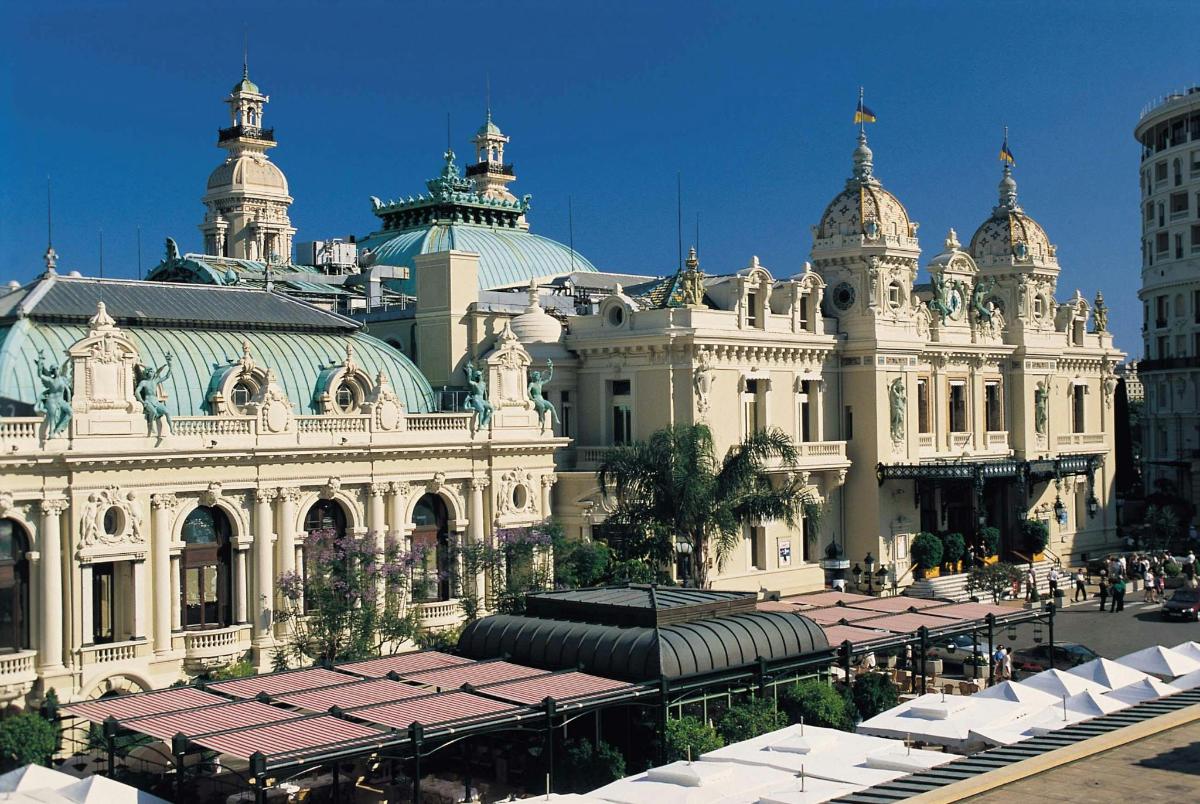 a large white building with domes on top of it