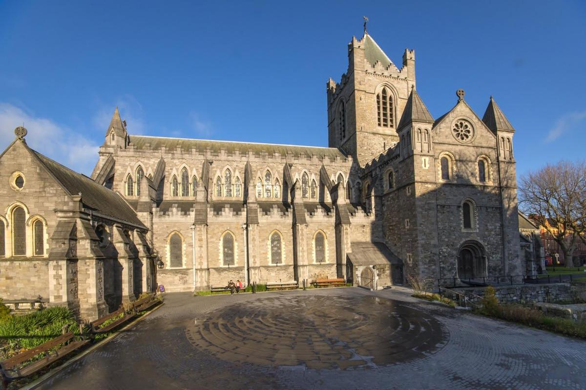 a large stone church with a clock tower