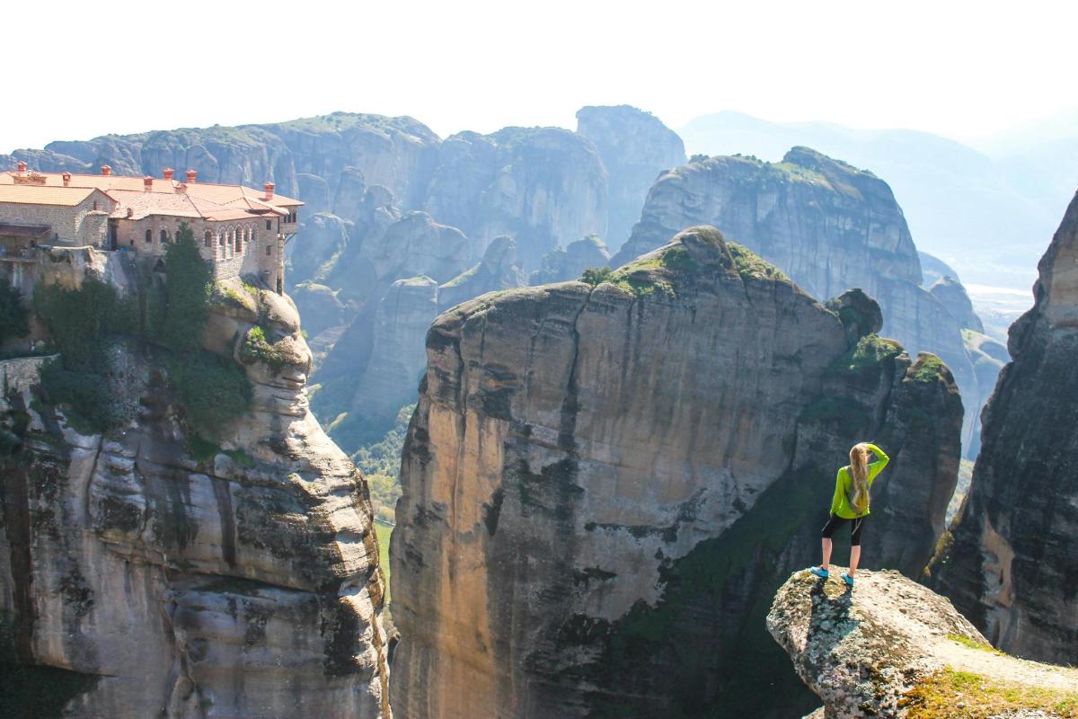 a person standing on top of a mountain