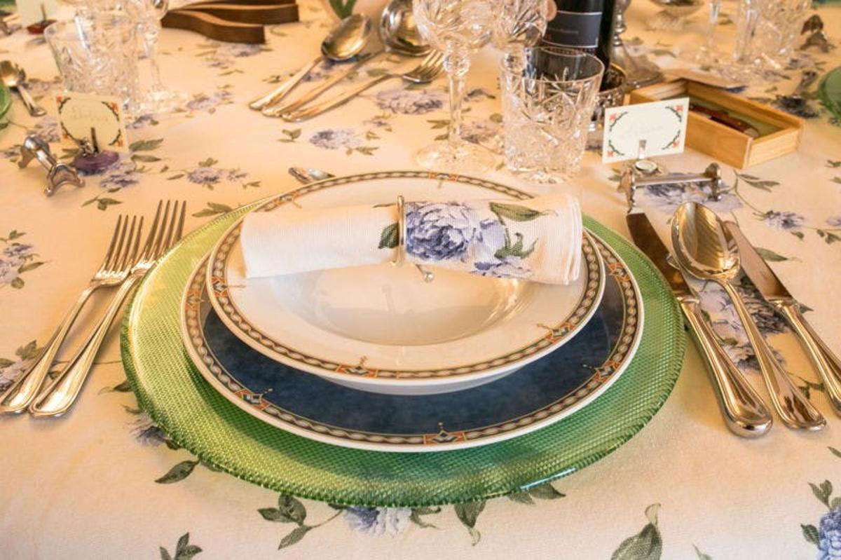 a table with a plate and silverware on it