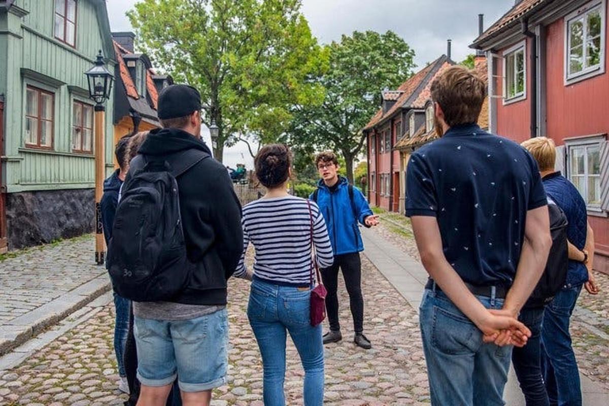 a group of people walking down a street