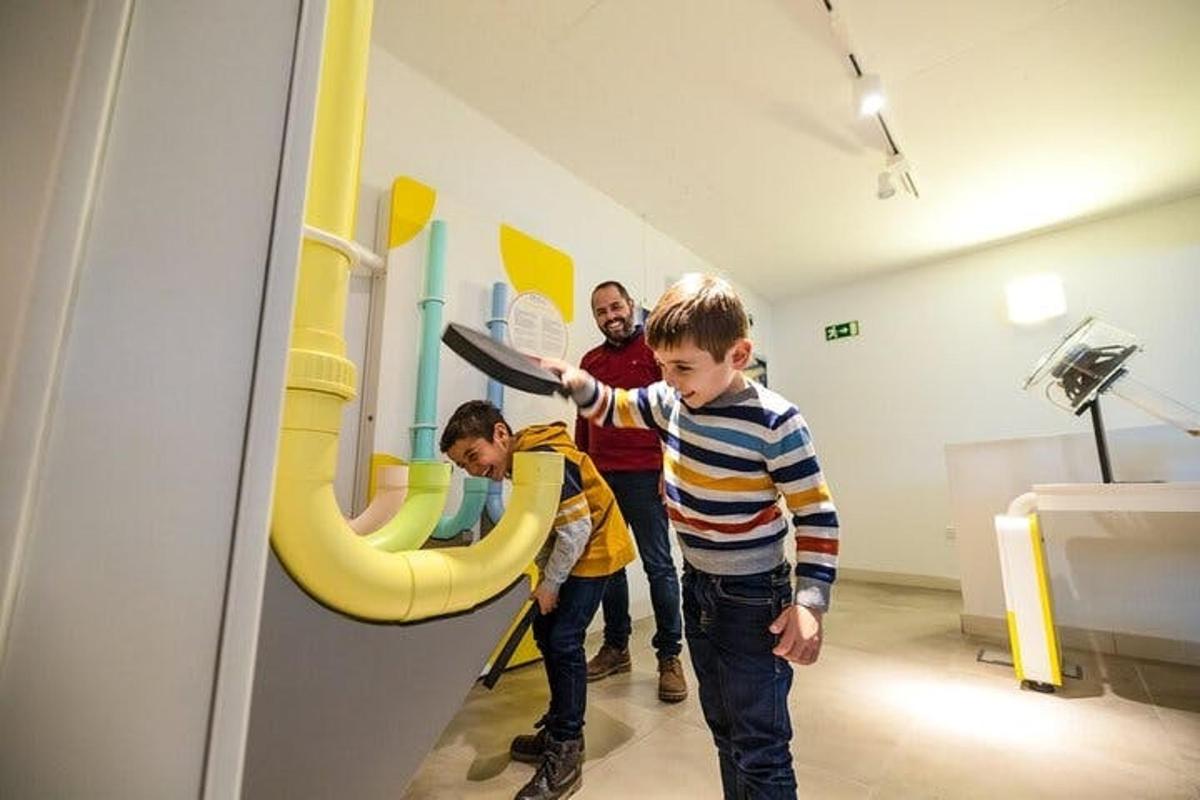 two young boys playing in an indoor playground