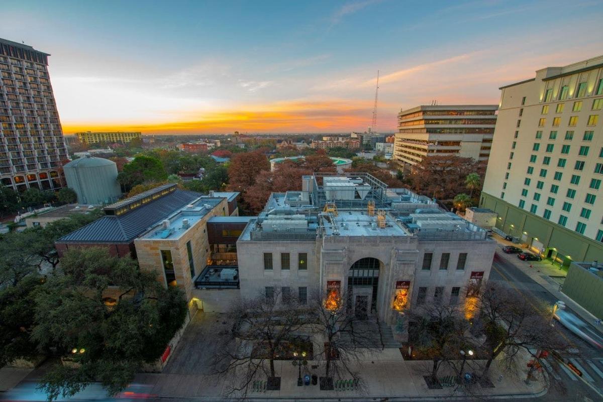 an aerial view of a building in a city