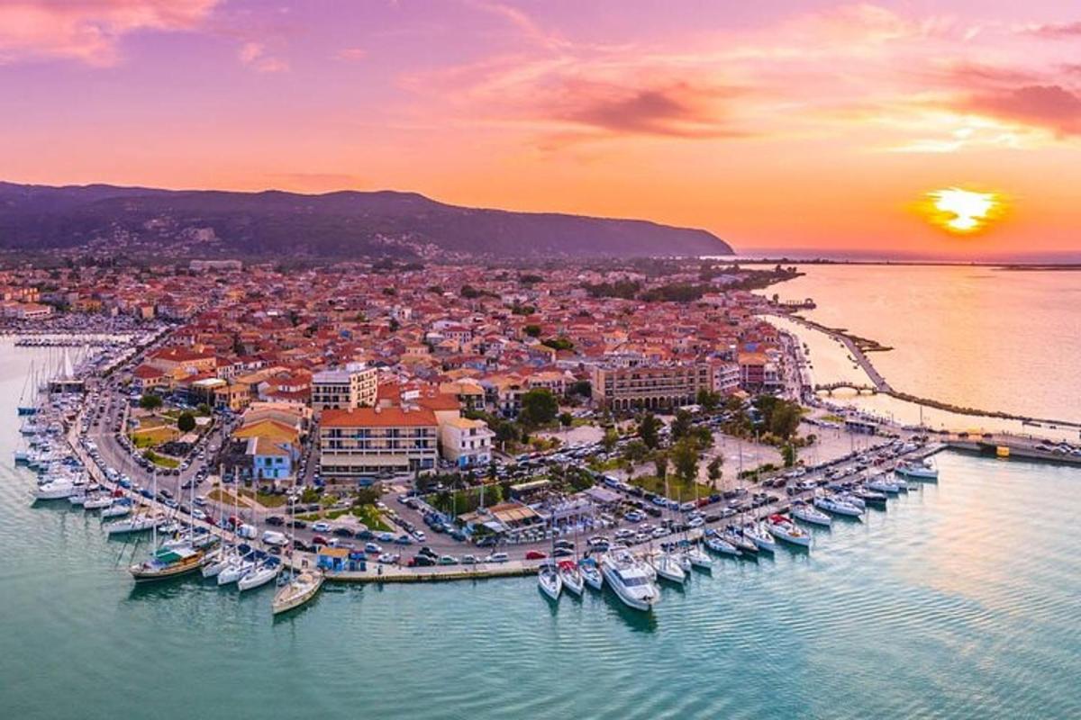 a group of boats docked in a harbor at sunset