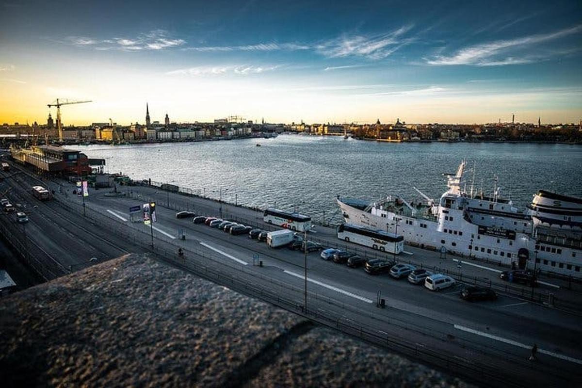 a large cruise ship is docked in a harbor