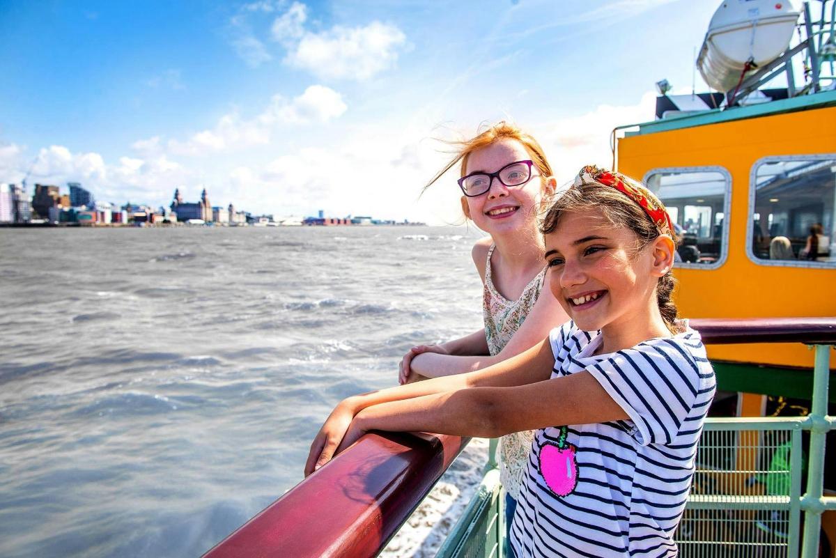 two girls on a boat on the water