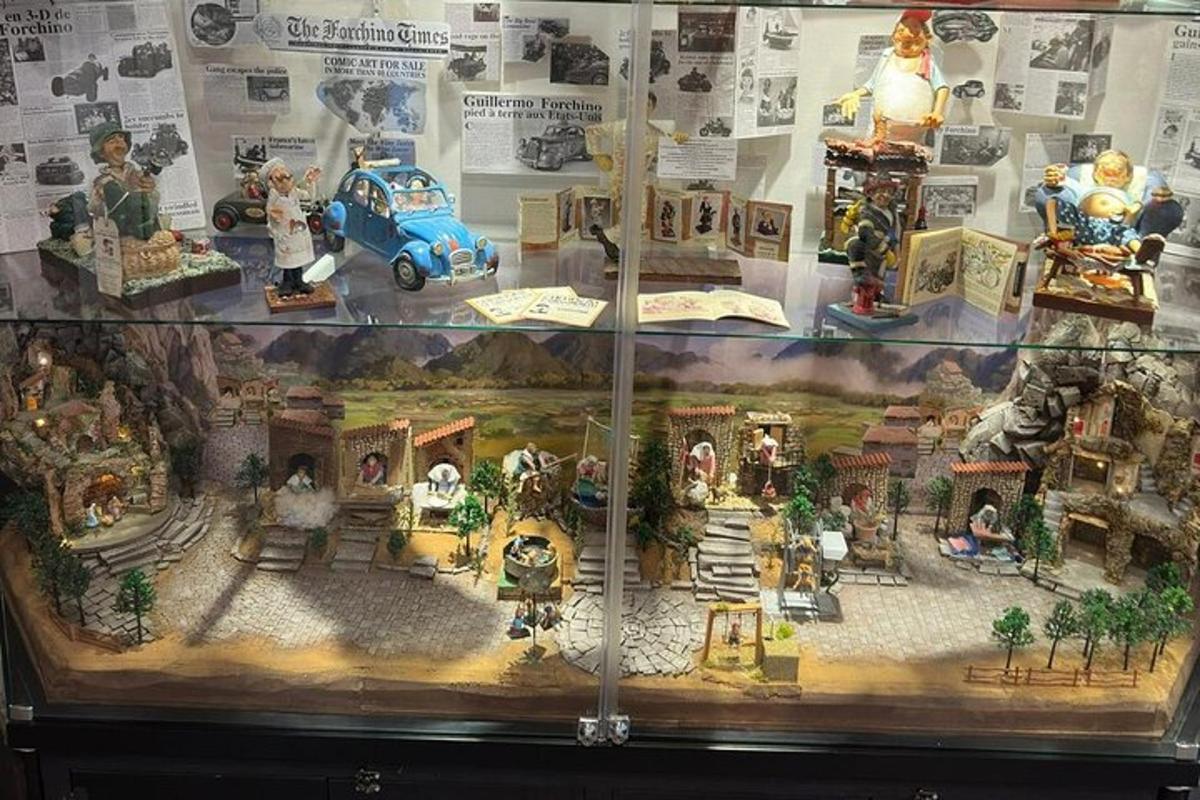 a display case with a model of a toy house