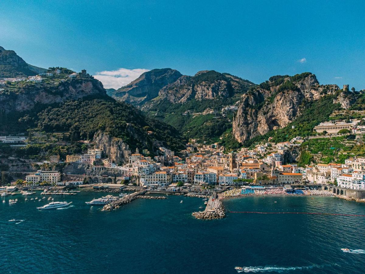 an aerial view of a town on the water