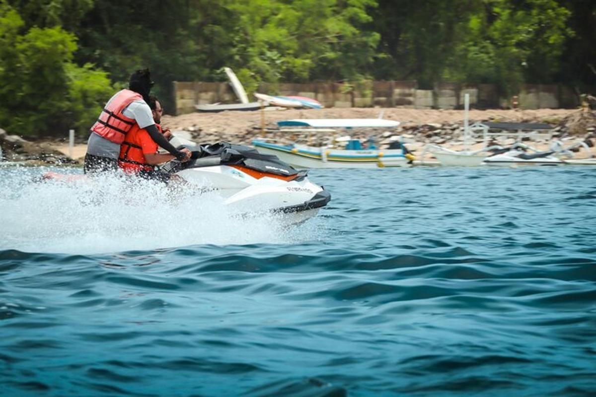 a man on a jet ski in the water