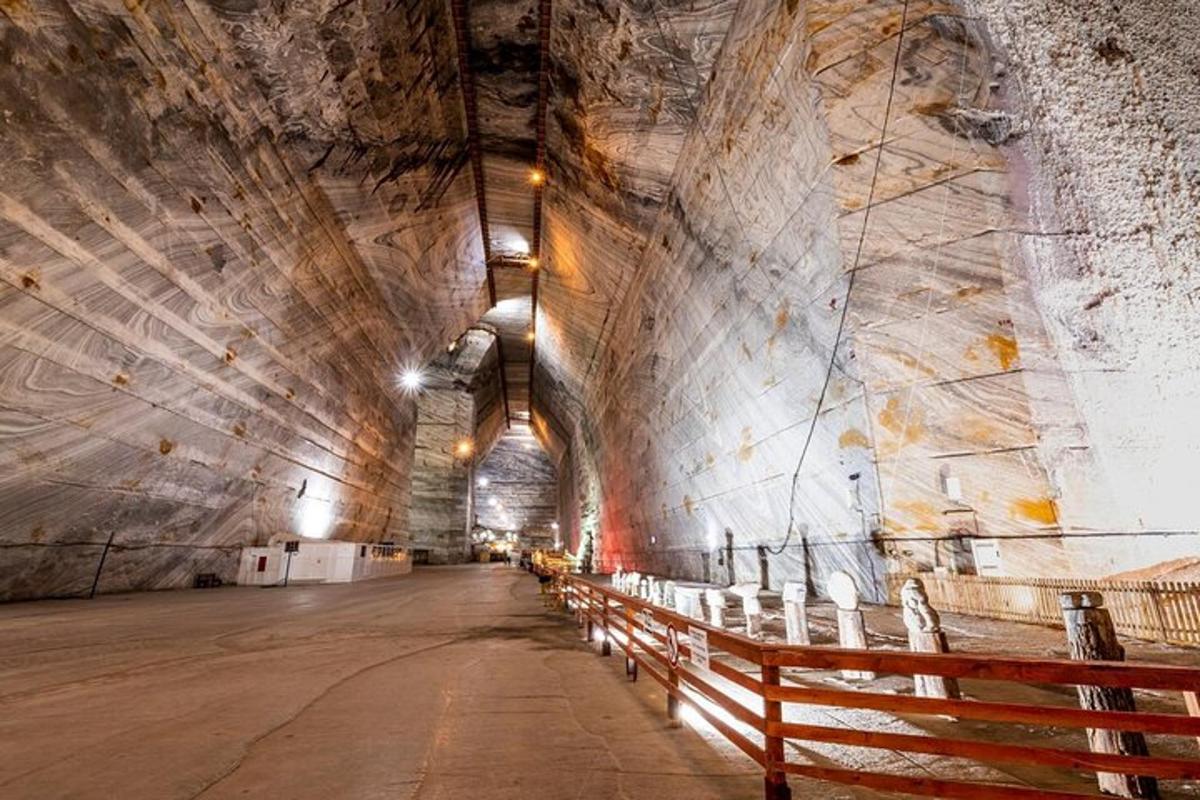 a long tunnel with a row of benches in it