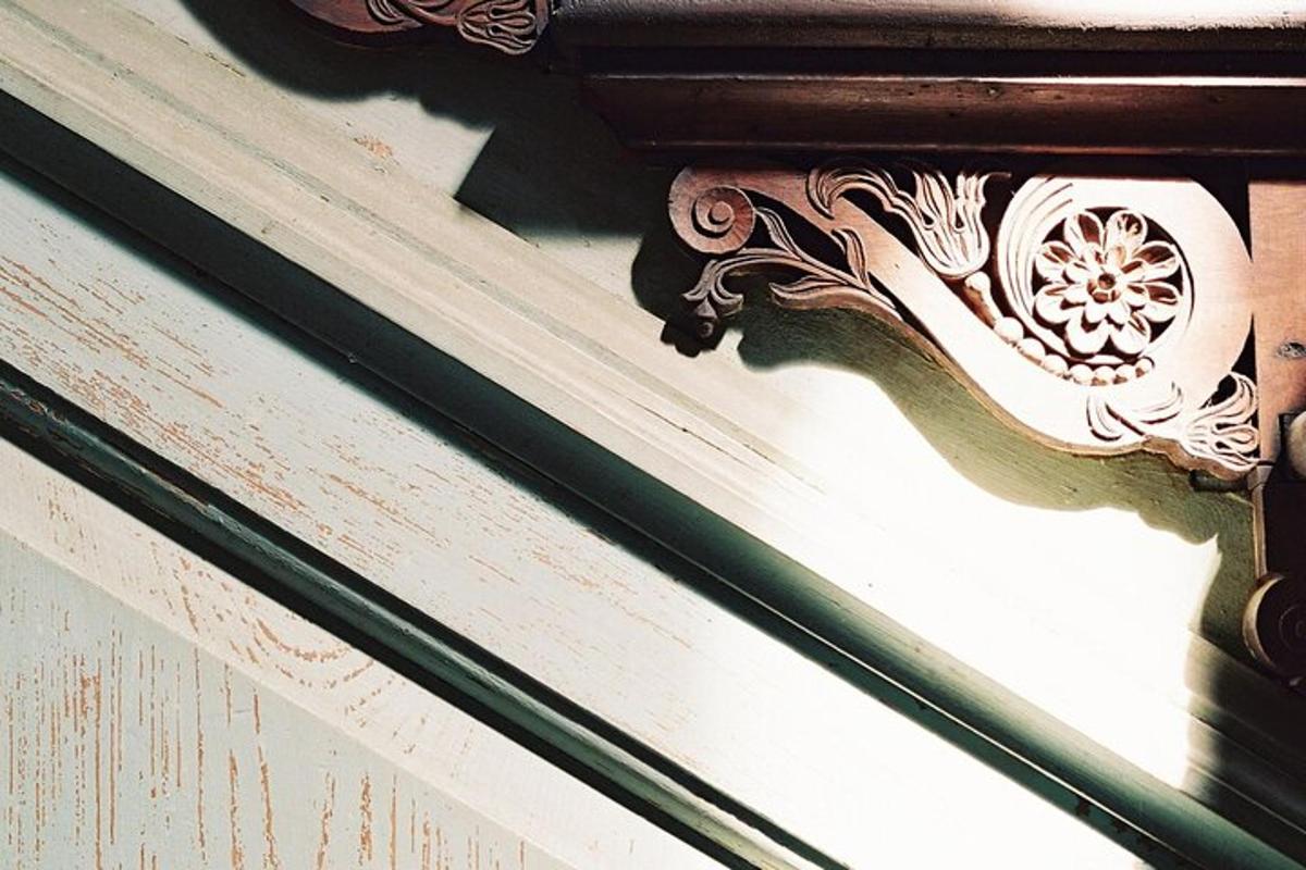 a close up of a wood trim on a building