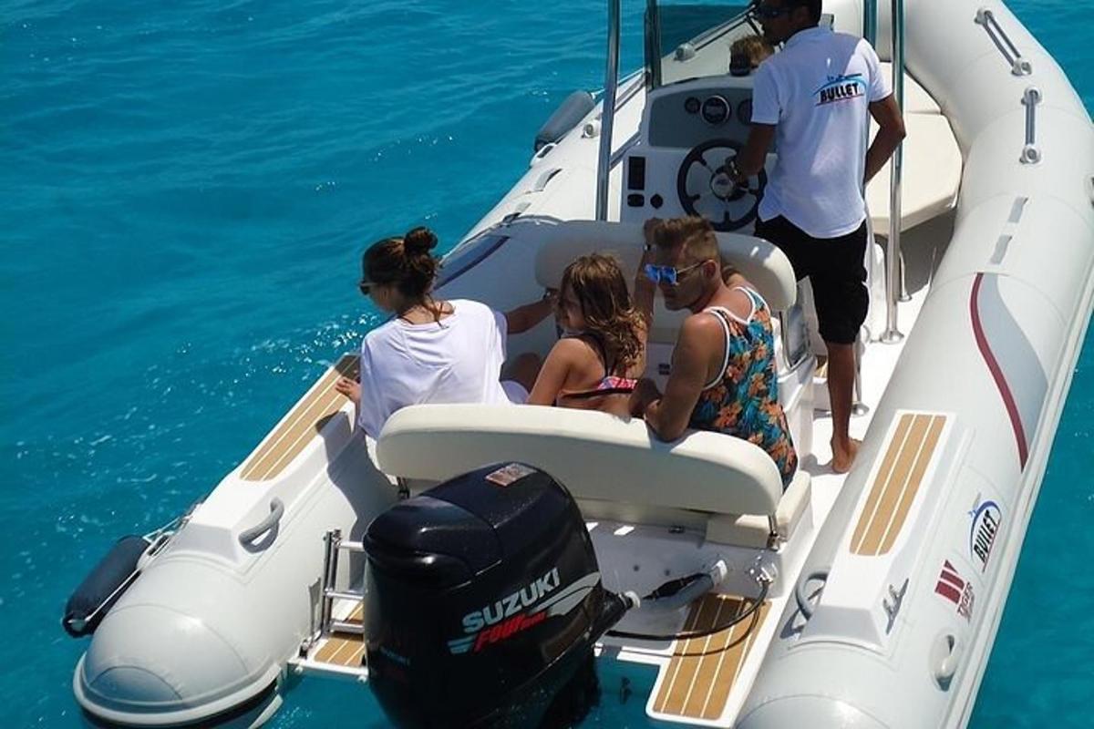 a group of people on a boat in the water