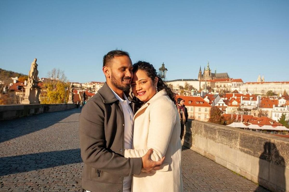 a man and a woman posing for a picture on a bridge
