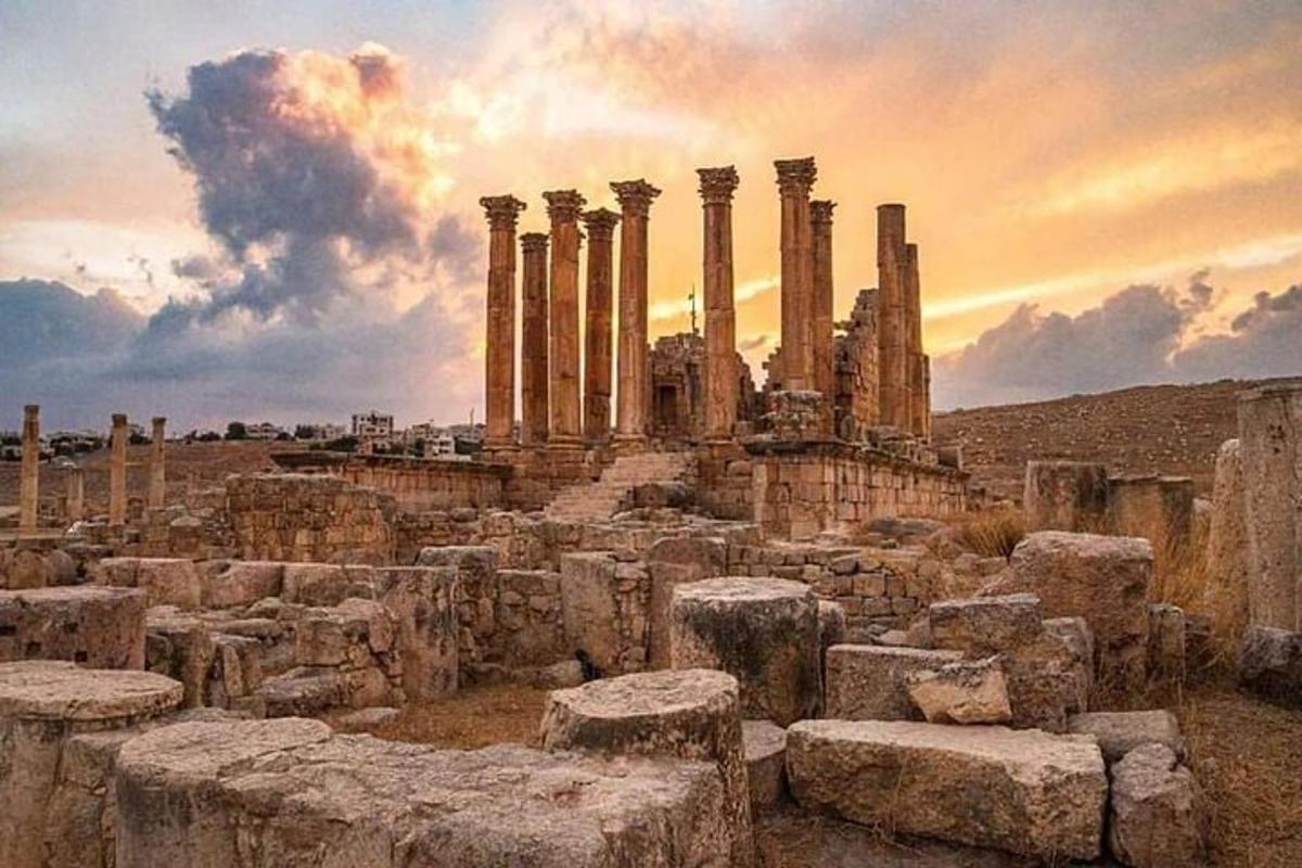 a view of the ruins of a building with columns