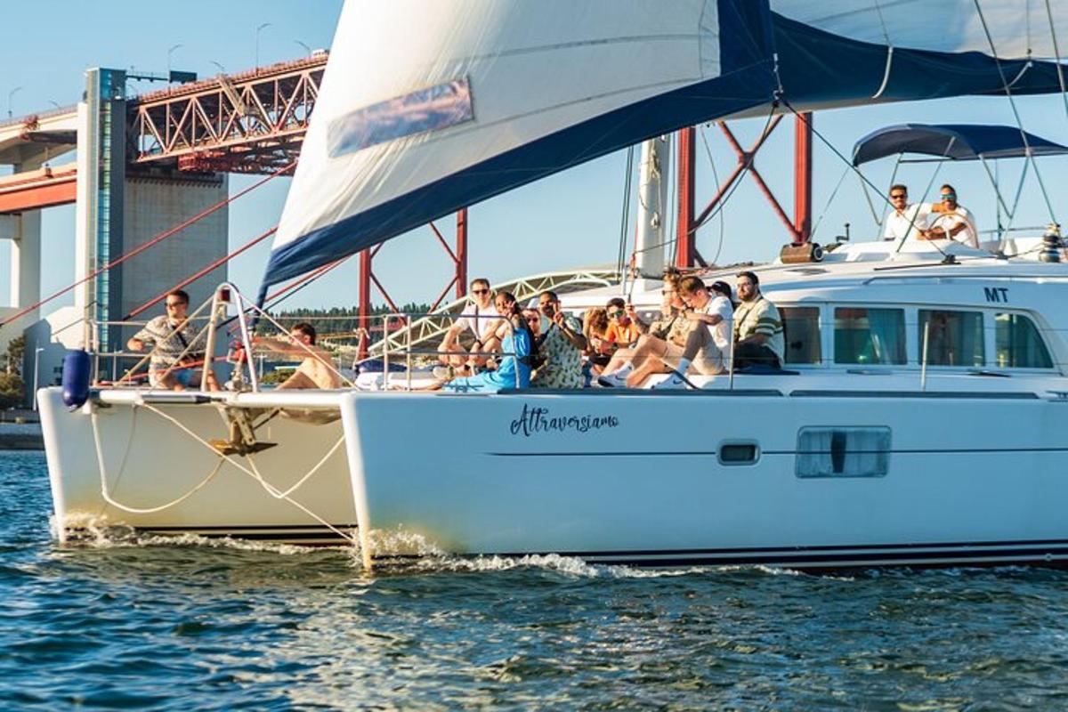 a group of people on a sail boat in the water